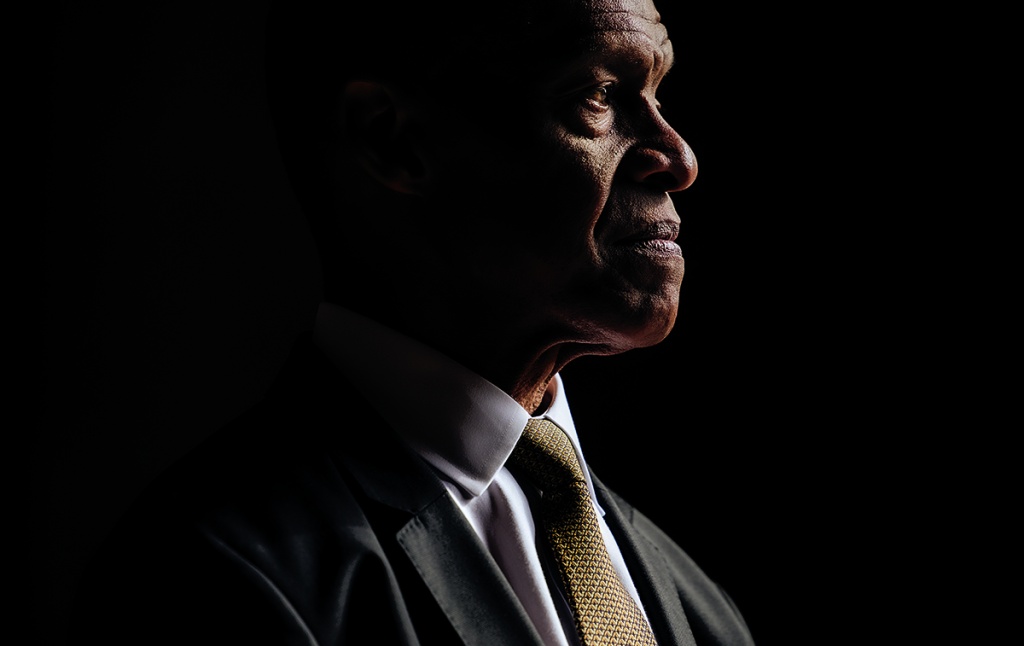 portrait of Erroll Southers on a dark background